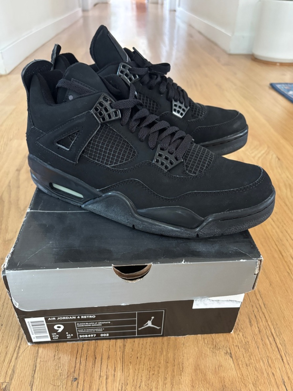 Nike Air Jordan 4 Retro — Men's Black Sneakers